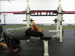 Fix forward head posture by performing Thoracic Extensions on a Bench 